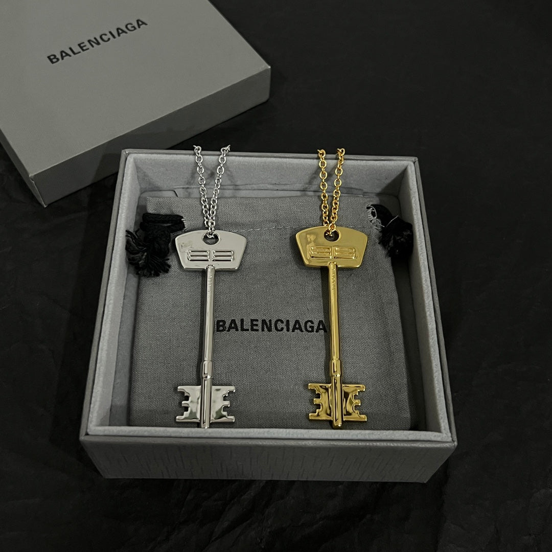 Martin Graham pendant necklace in polished metal-tone – styled product view