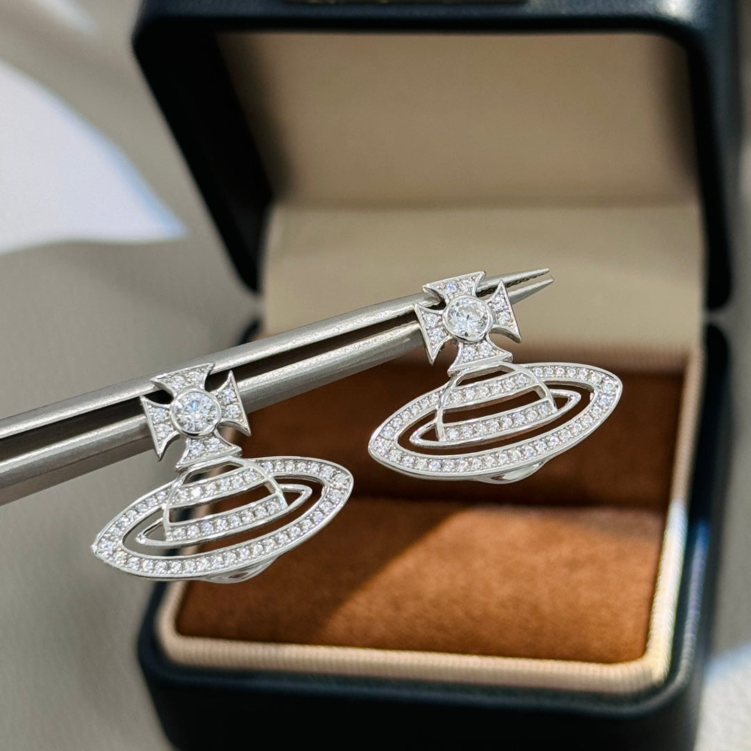 Martin Graham stud earrings in polished metal-tone – side detail