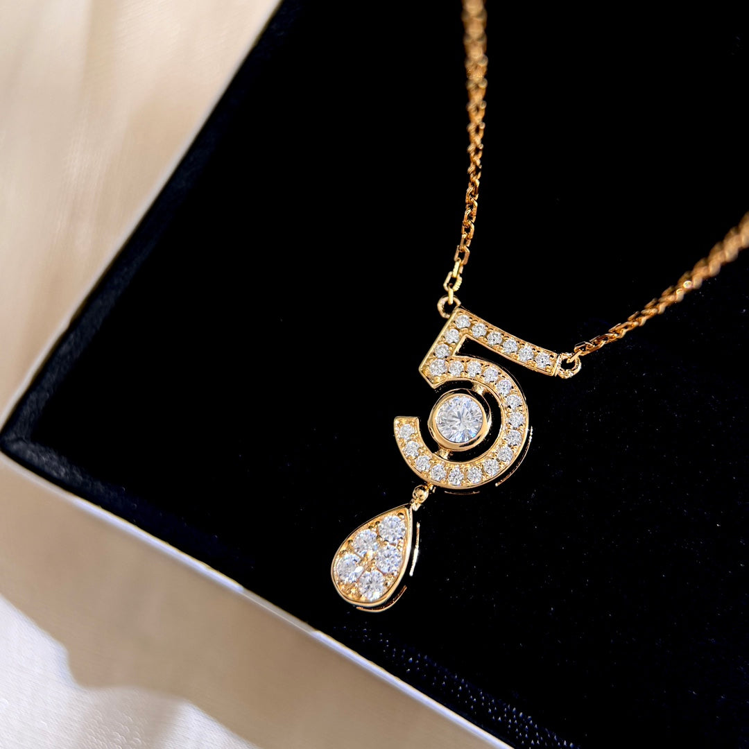 Martin Graham pendant necklace in polished metal-tone – side detail