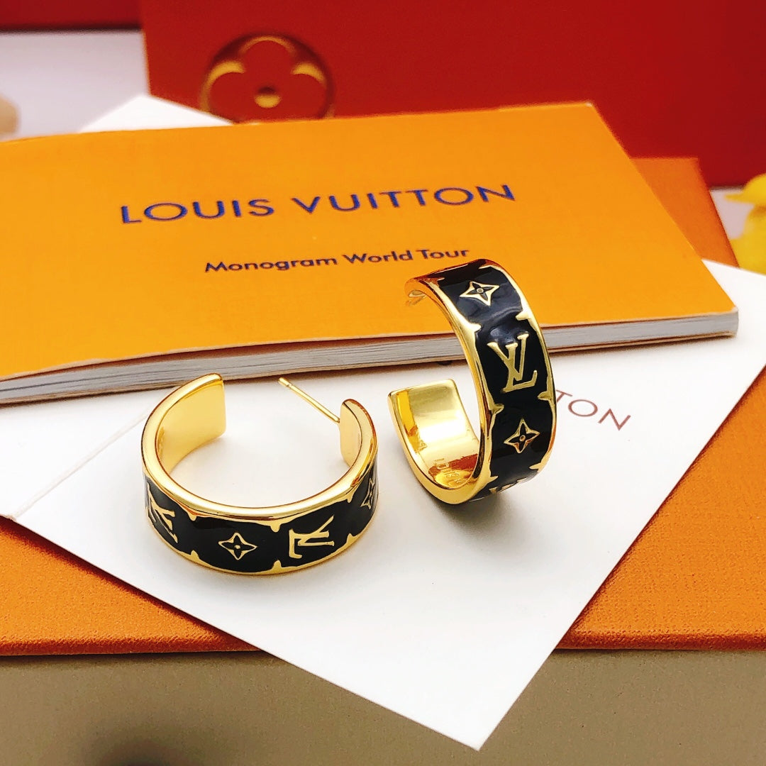 Martin Graham earrings in polished metal-tone – front product view
