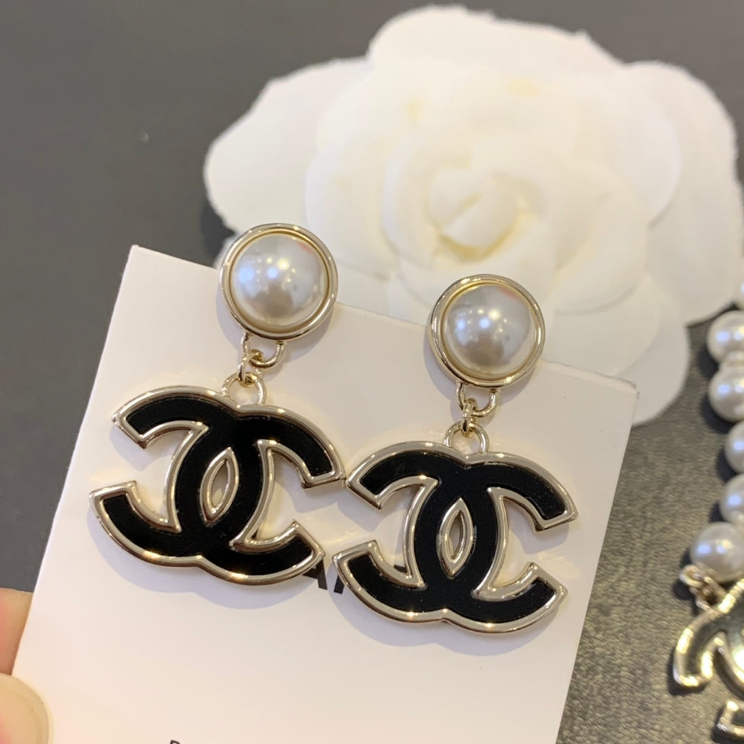 Martin Graham stud earrings in polished metal-tone – main product view