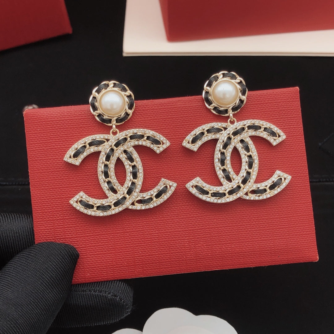 Martin Graham earrings in polished metal-tone – styled product view
