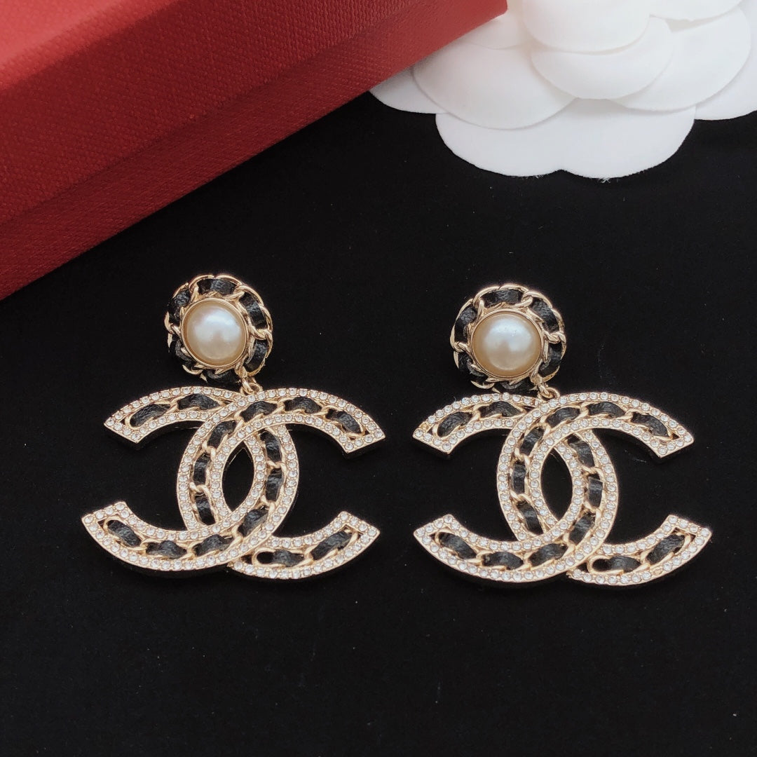 Martin Graham earrings in polished metal-tone – side detail
