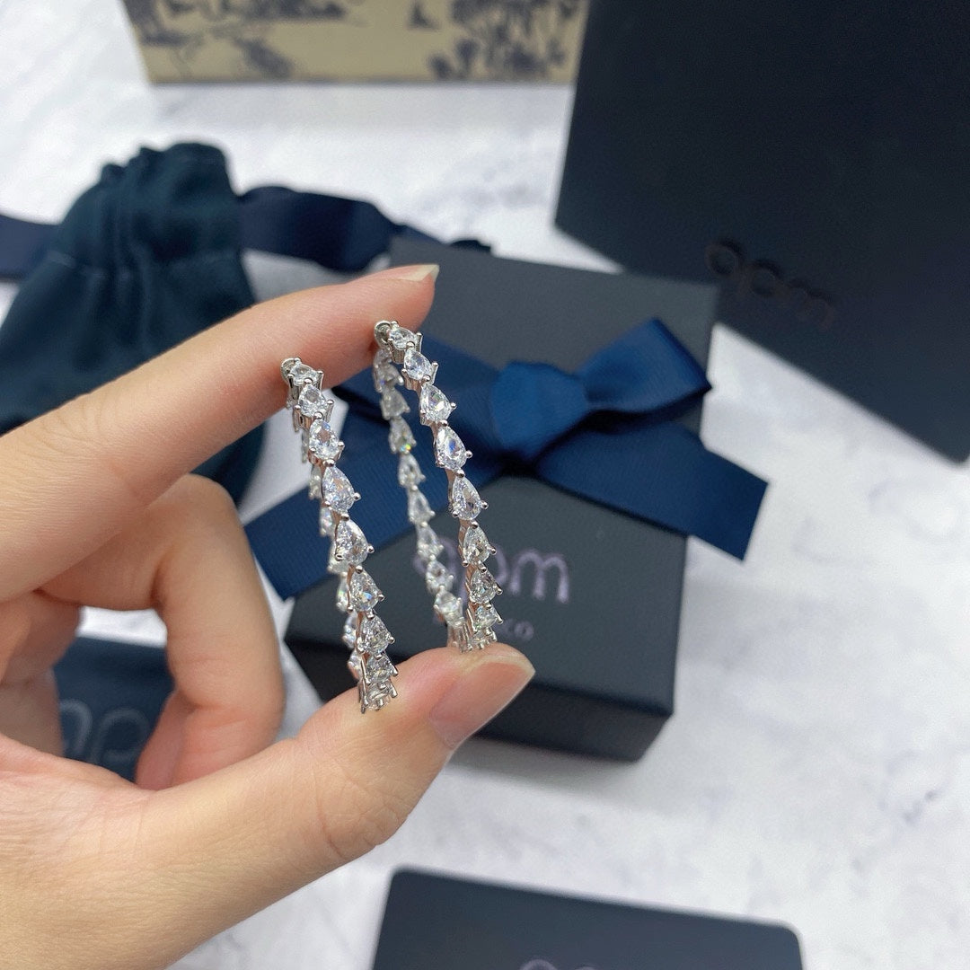Martin Graham earrings in polished metal-tone – side detail