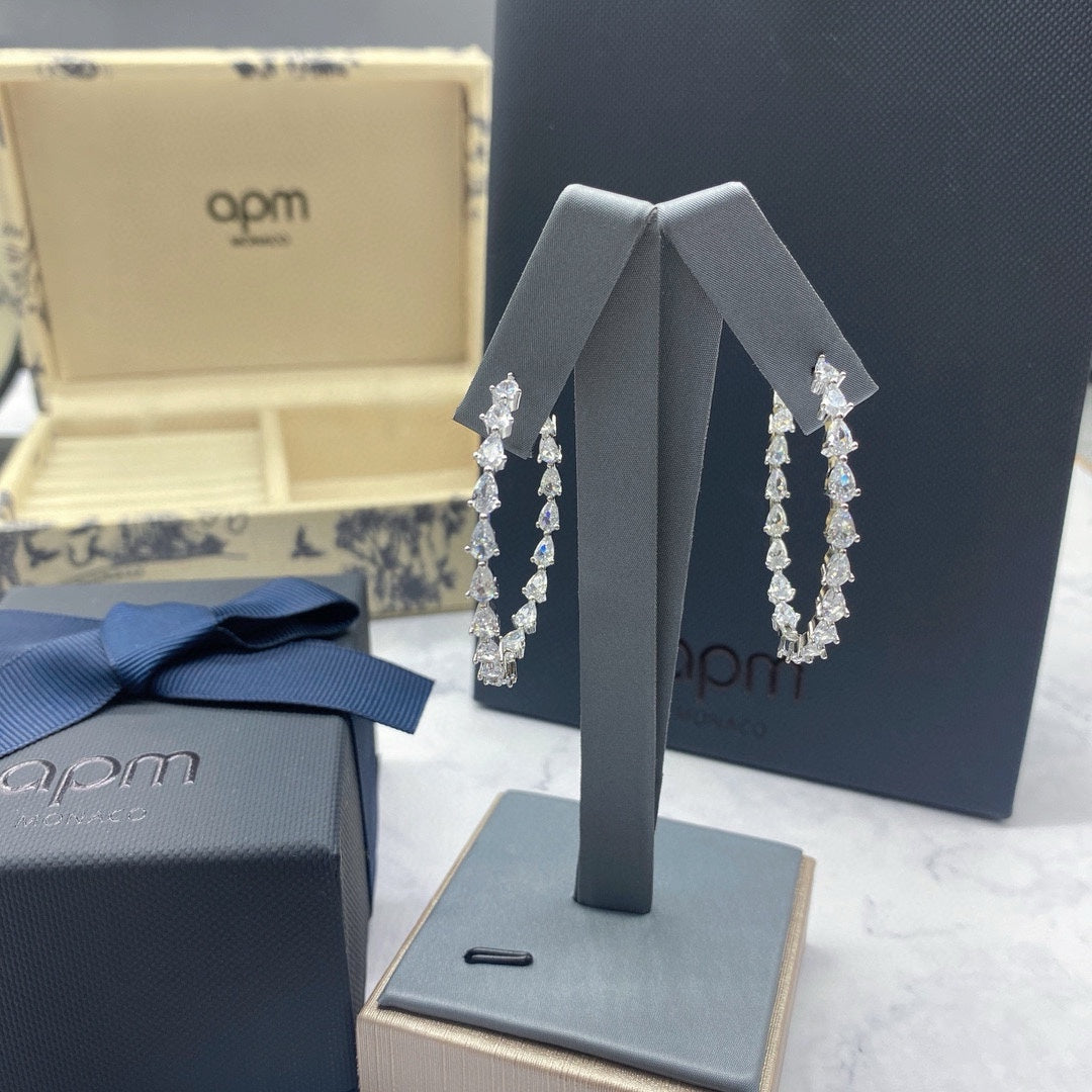 Martin Graham earrings in polished metal-tone – front product view