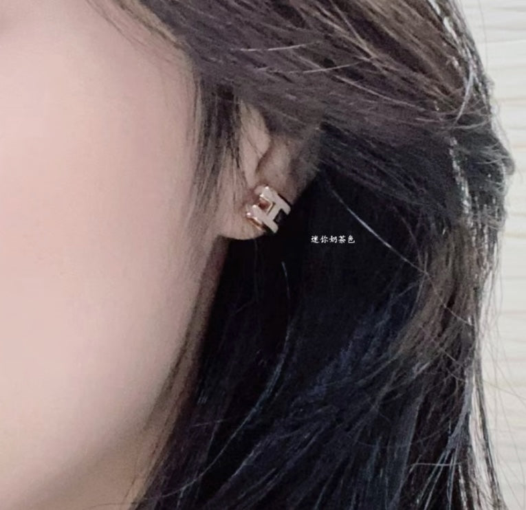Martin Graham stud earrings in polished metal-tone – main product view