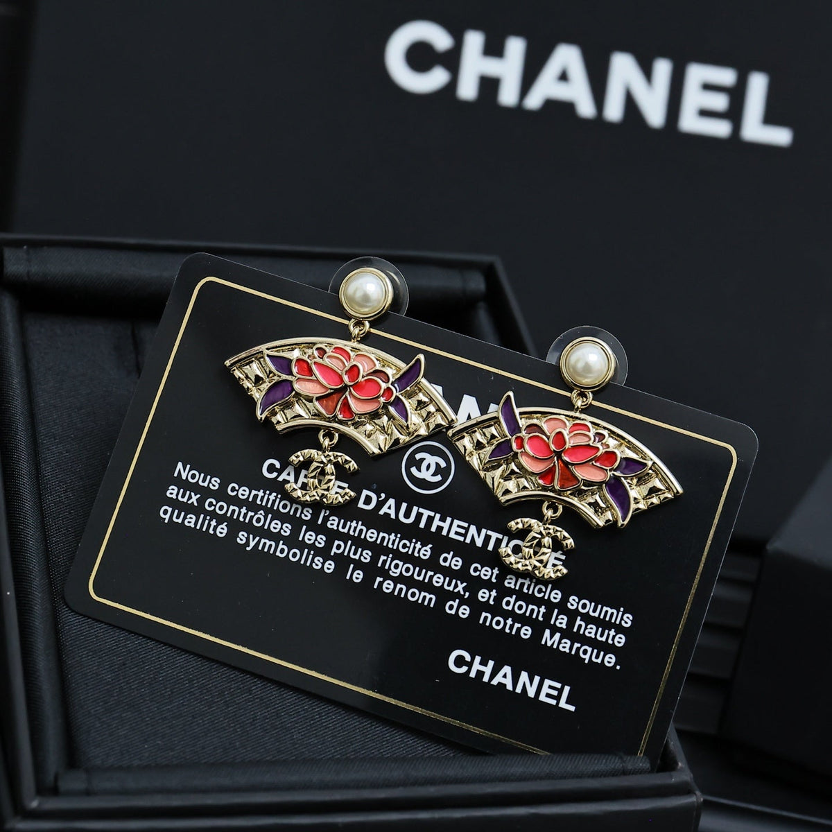 Martin Graham earrings in polished metal-tone – close-up detail