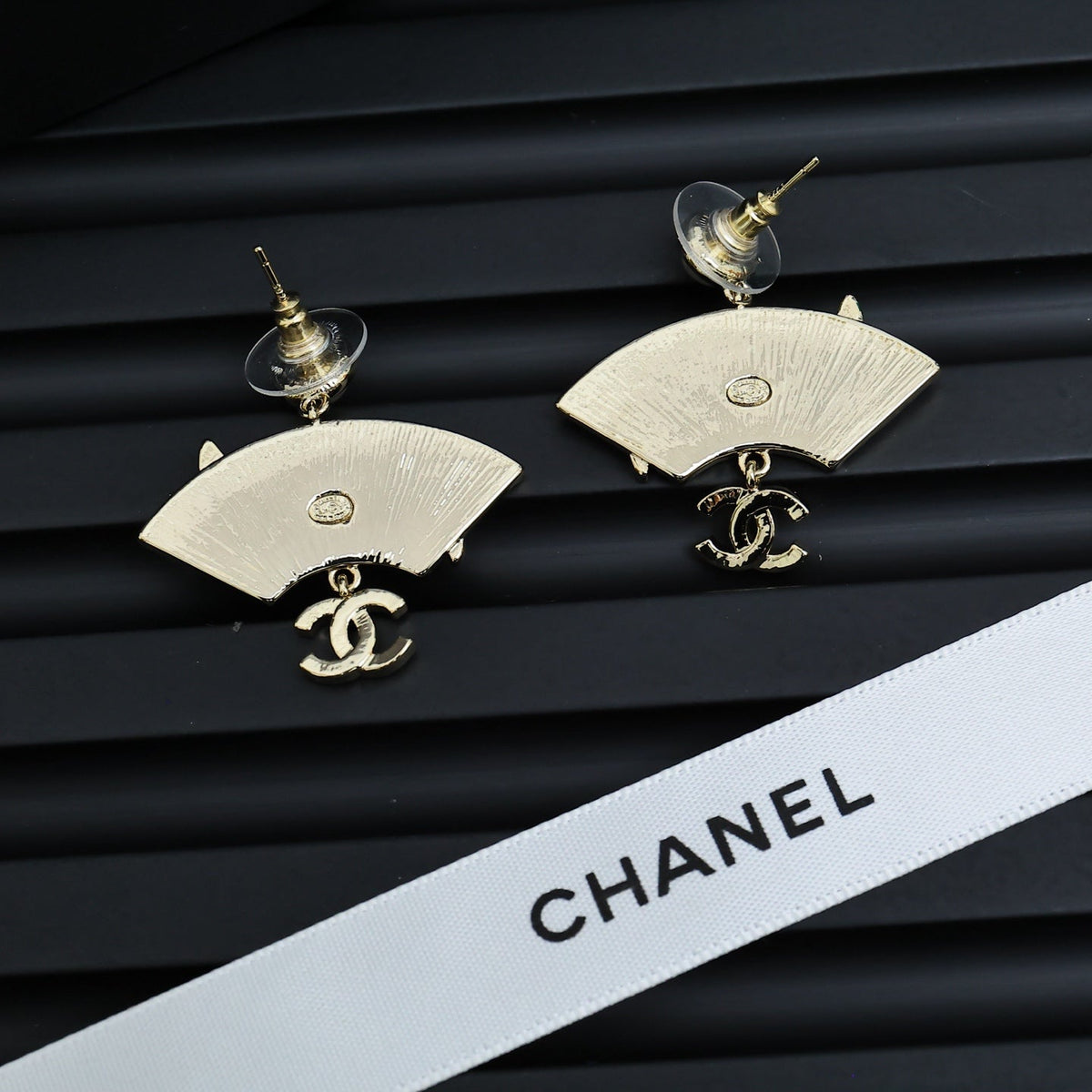 Martin Graham earrings in polished metal-tone – styled product view