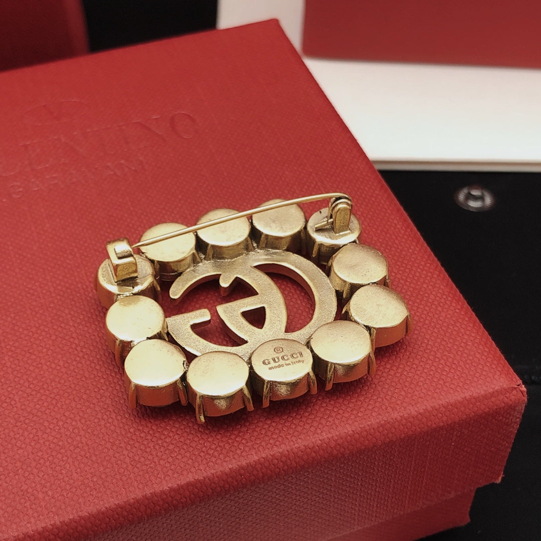 Martin Graham brooch in polished metal-tone – close-up detail