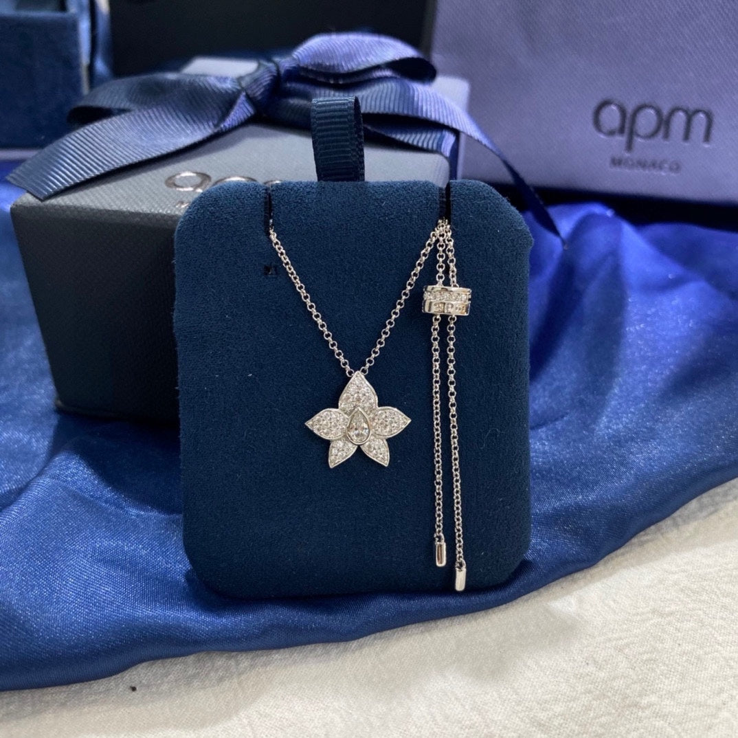 Martin Graham pendant necklace in polished metal-tone – side detail
