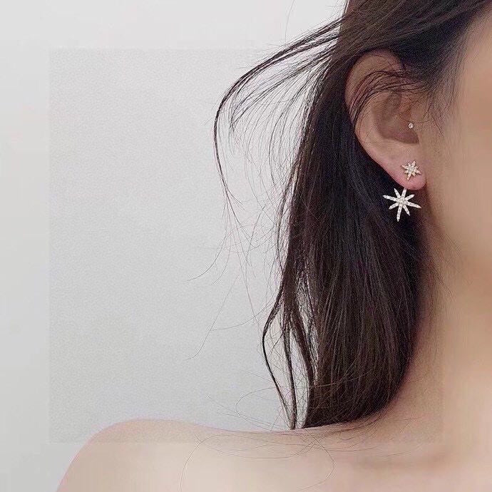 Martin Graham stud earrings in polished metal-tone – front product view