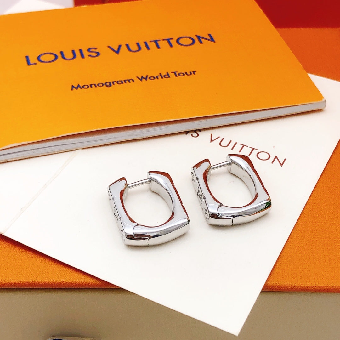 Martin Graham earrings in polished metal-tone – front product view