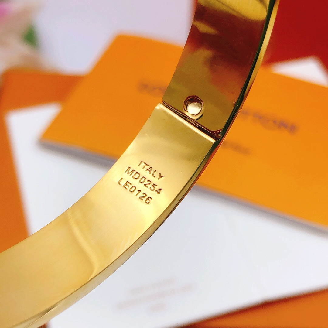 Martin Graham bangle in polished metal-tone – styled product view