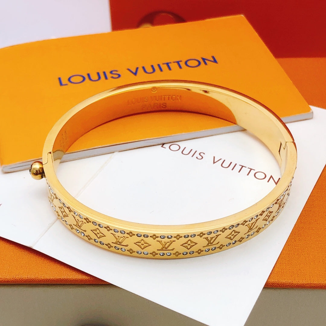 Martin Graham bangle in polished metal-tone – front product view