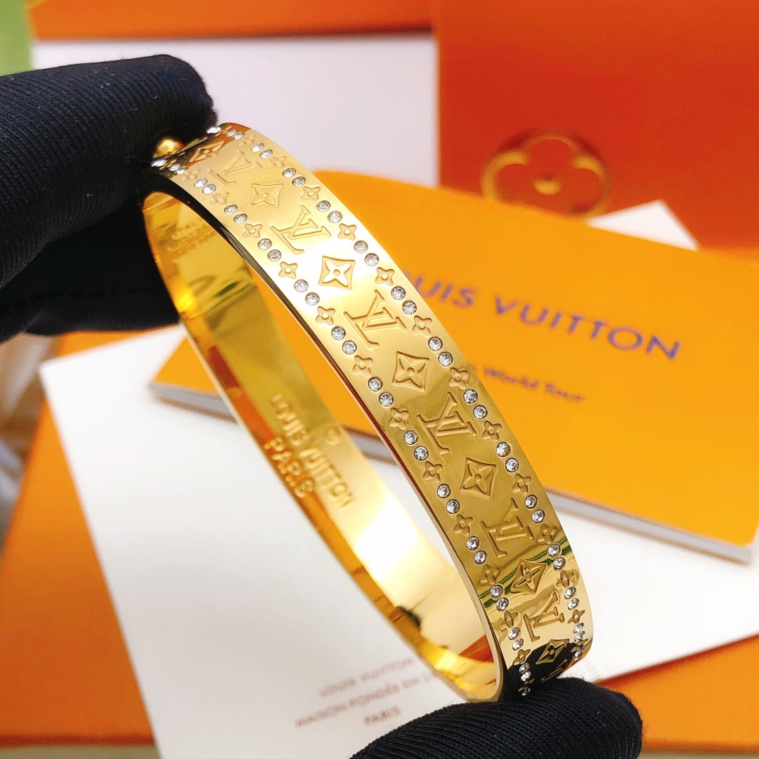 Martin Graham bangle in polished metal-tone – close-up detail