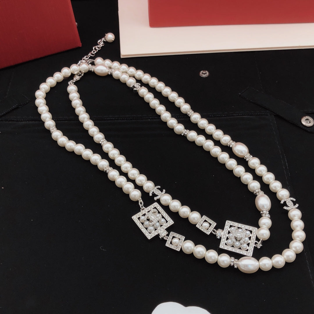 Martin Graham pendant necklace in polished metal-tone – styled product view