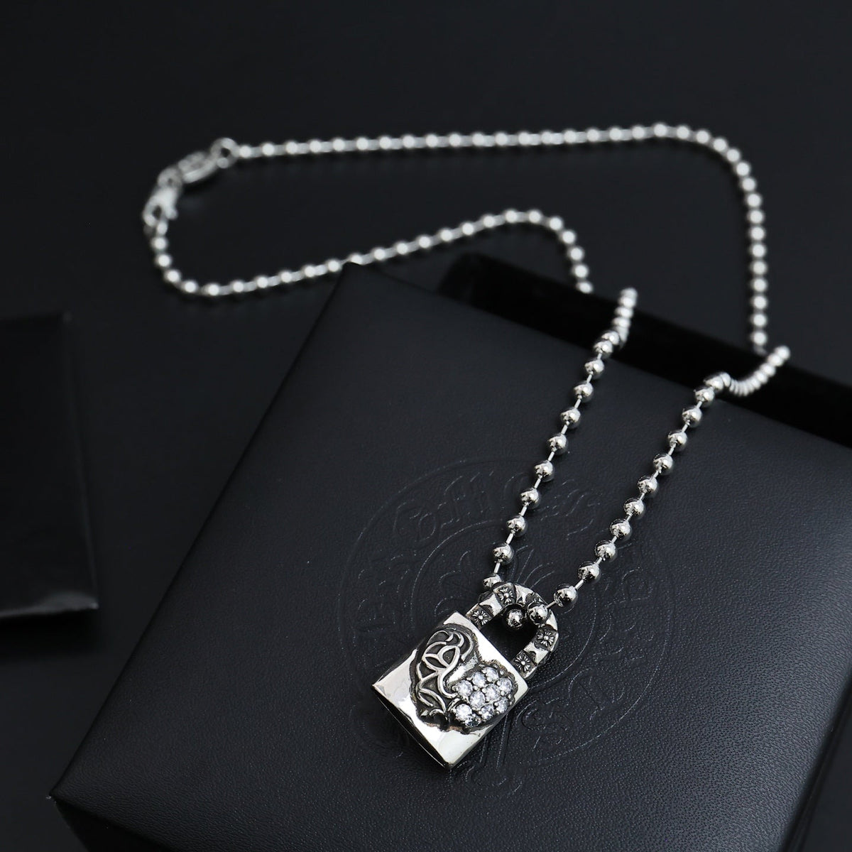 Martin Graham pendant necklace in polished metal-tone – front product view