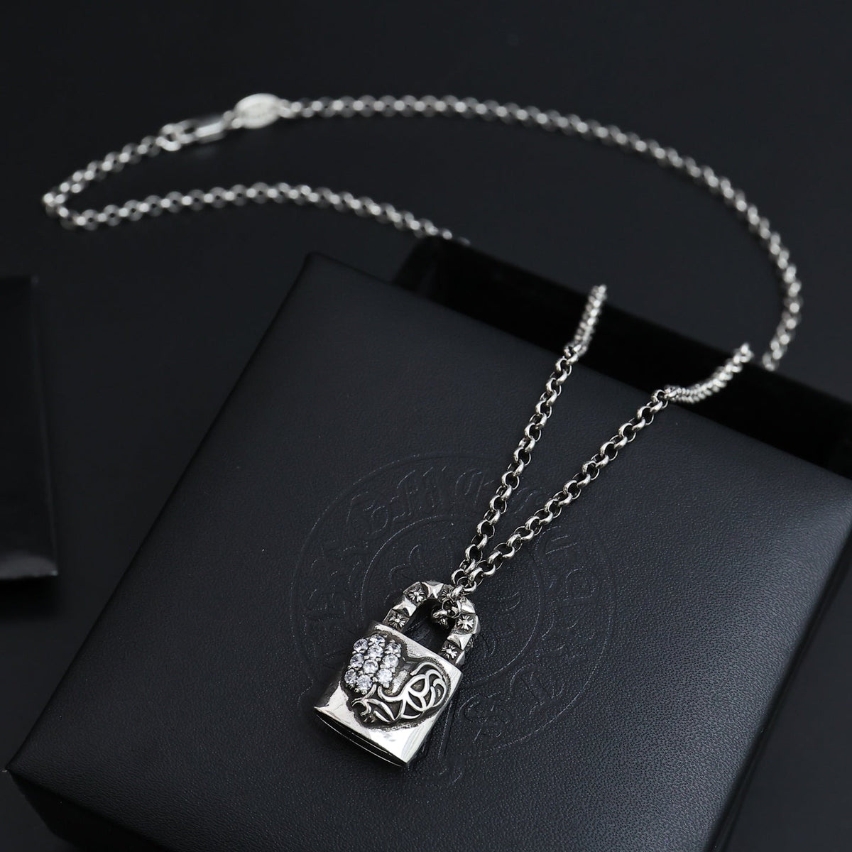 Martin Graham pendant necklace in polished metal-tone – detail view