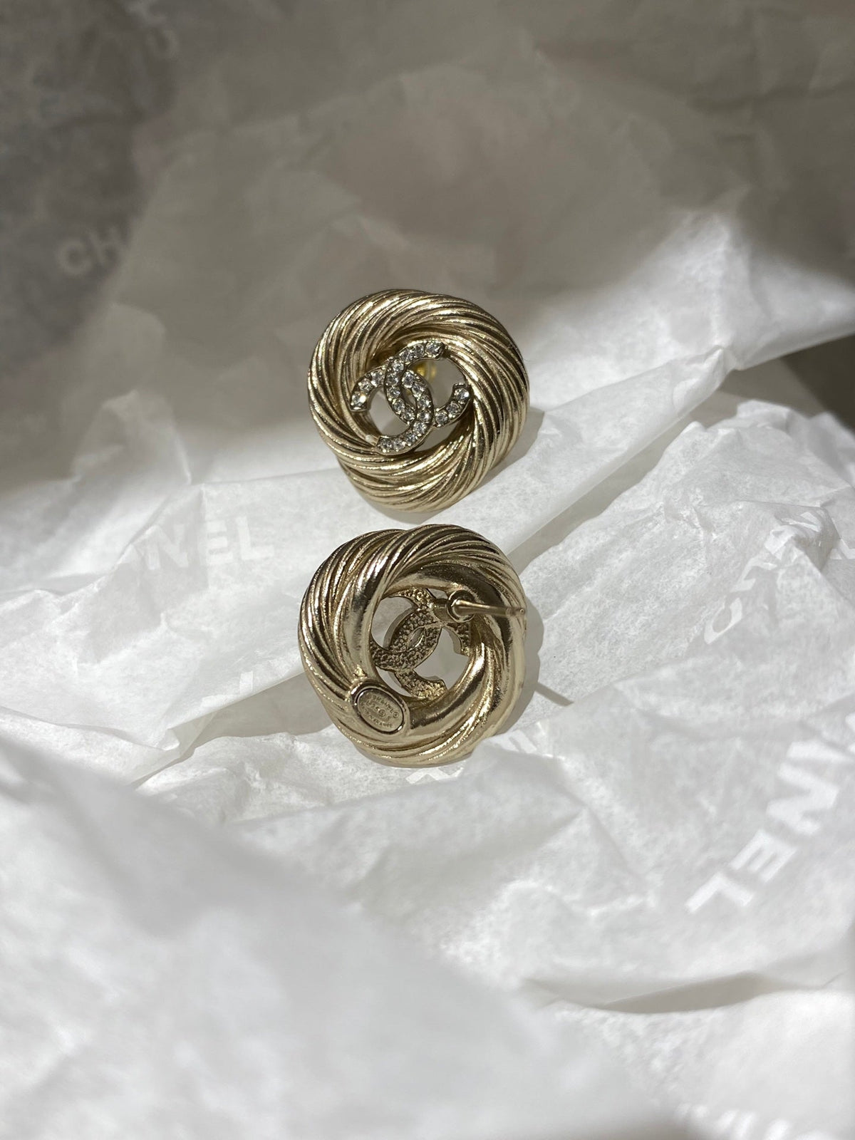Martin Graham stud earrings in polished metal-tone – side detail
