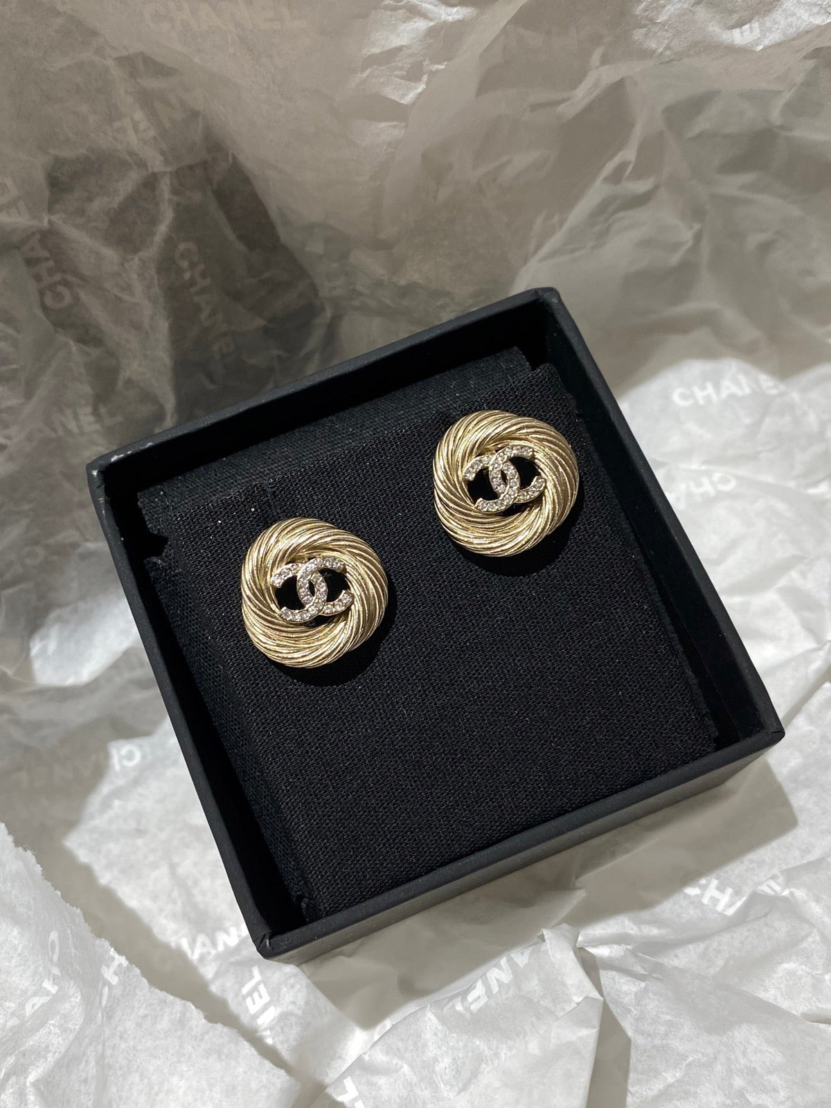 Martin Graham stud earrings in polished metal-tone – close-up detail