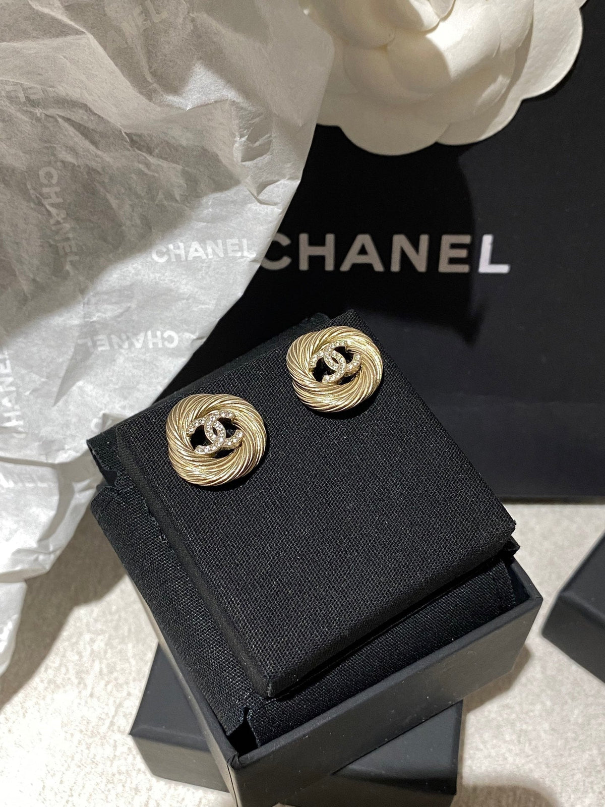 Martin Graham stud earrings in polished metal-tone – detail view