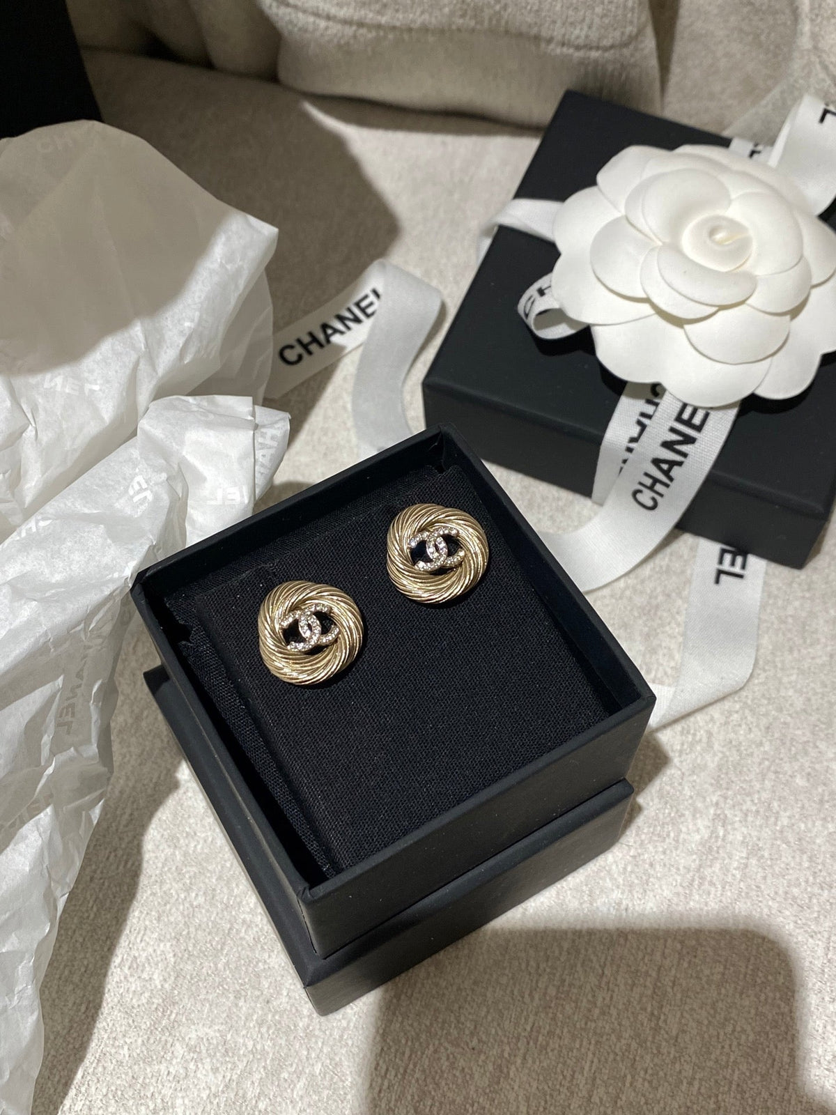Martin Graham stud earrings in polished metal-tone – styled product view