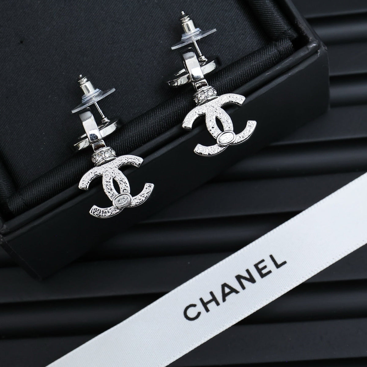 Martin Graham earrings in polished metal-tone – detail view