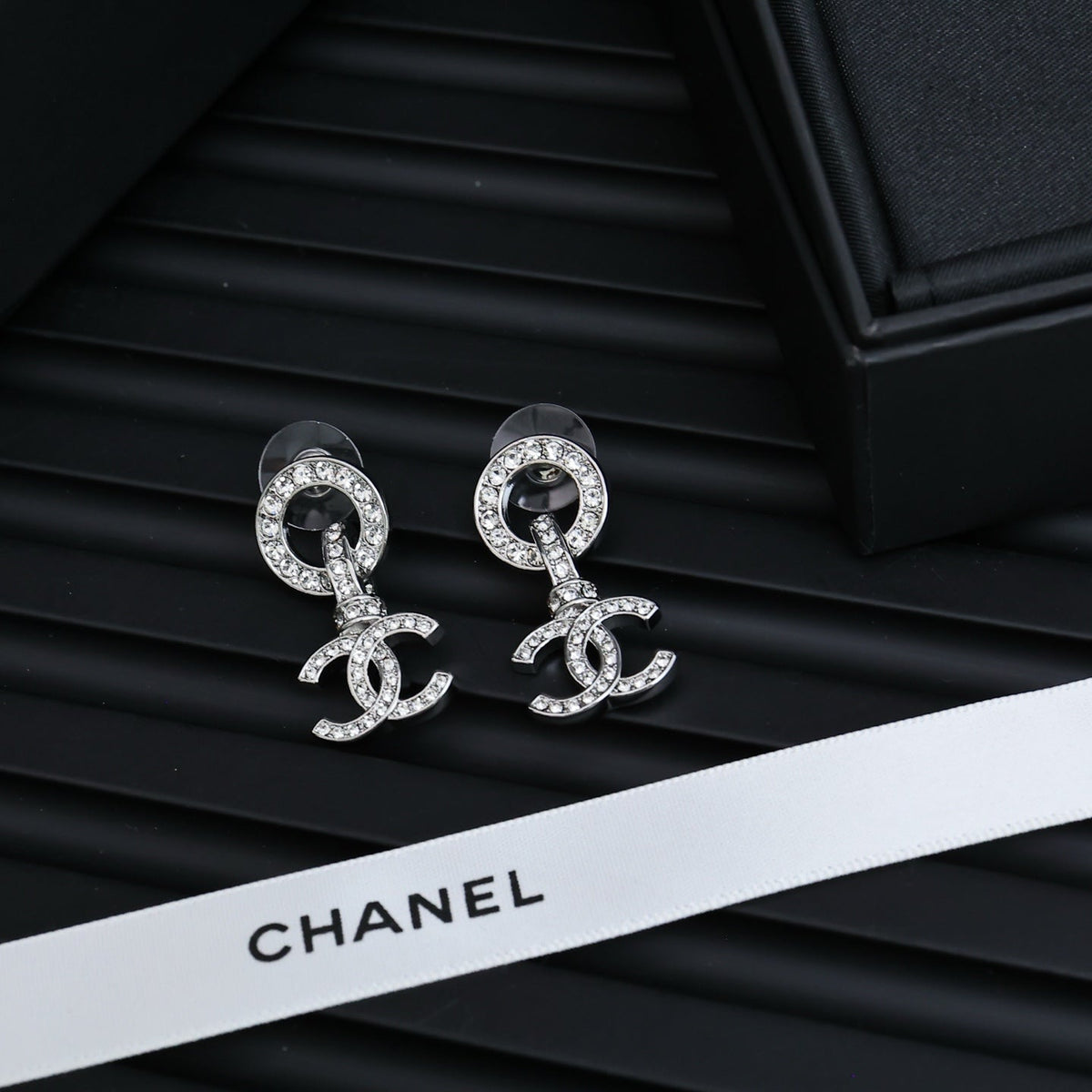 Martin Graham earrings in polished metal-tone – styled product view