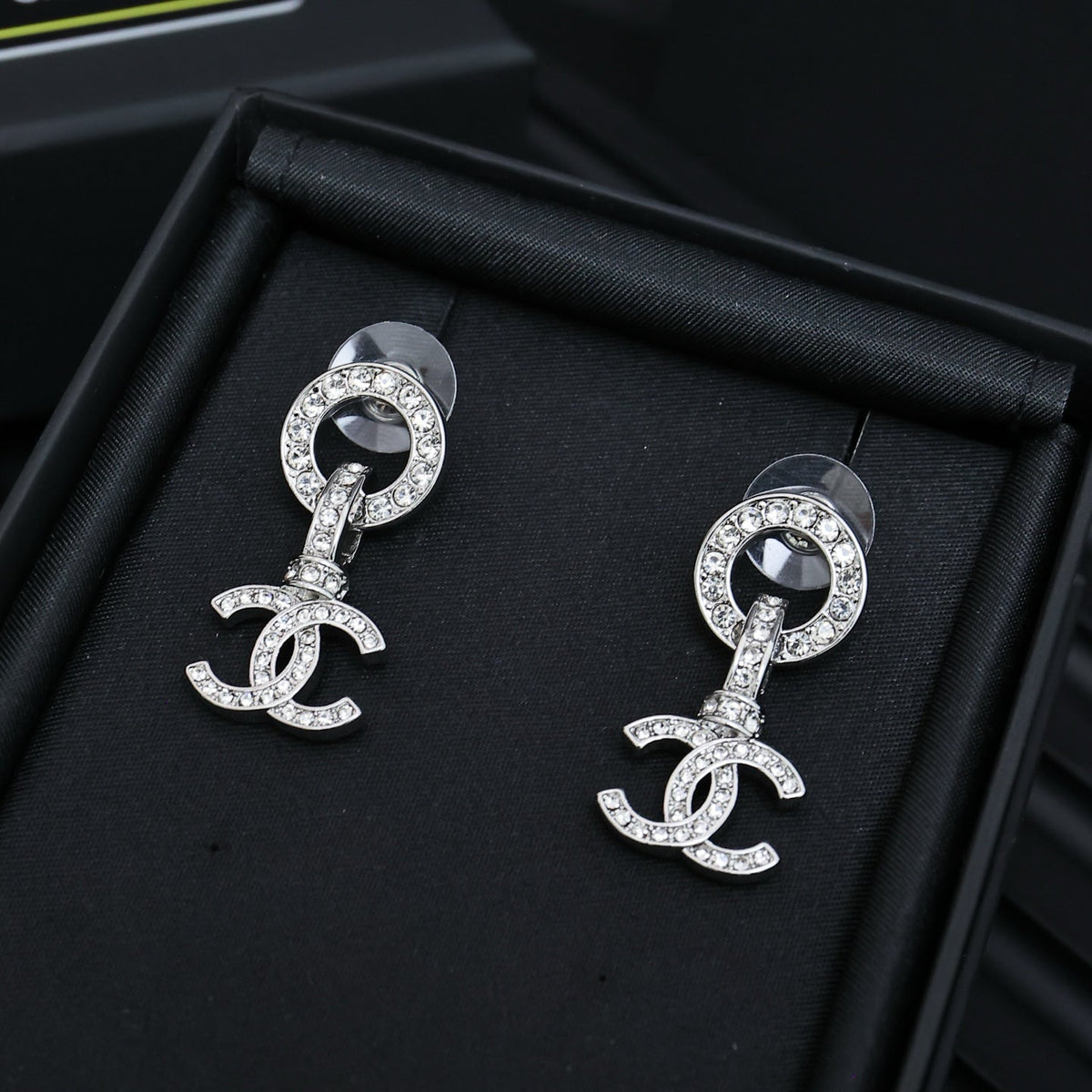 Martin Graham earrings in polished metal-tone – front product view