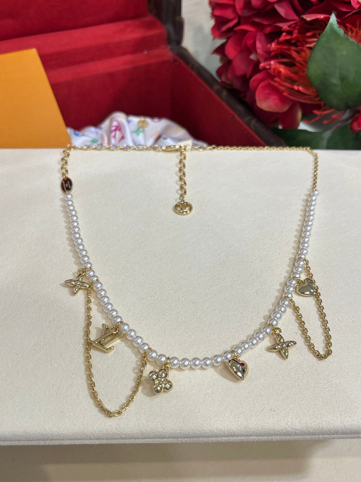 Martin Graham pendant necklace in polished metal-tone – side detail