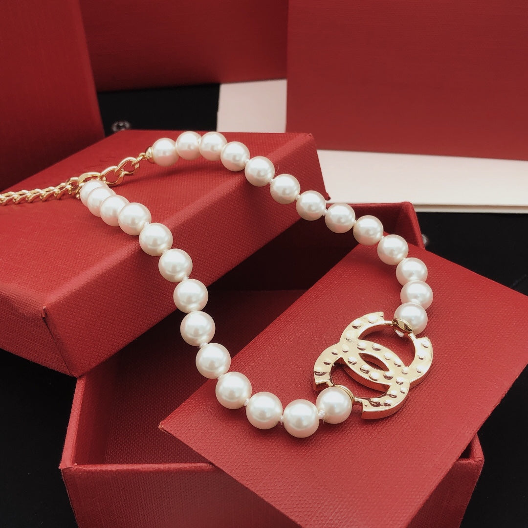 Martin Graham pendant necklace in polished metal-tone – styled product view