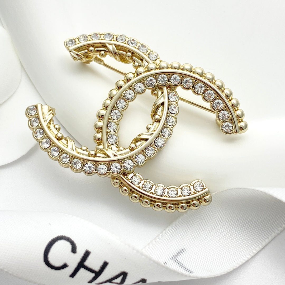 Martin Graham brooch in polished metal-tone – front product view