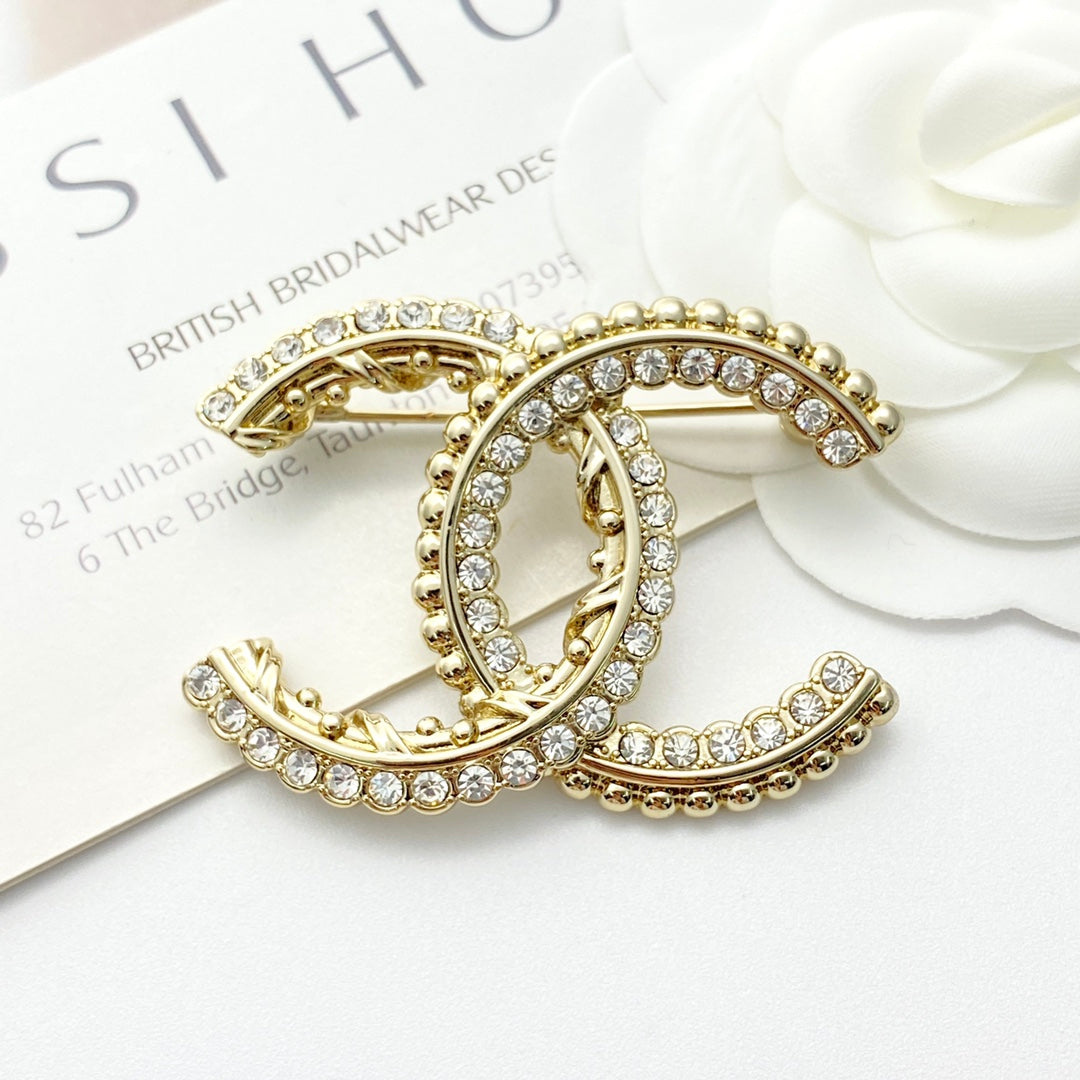 Martin Graham brooch in polished metal-tone – styled product view