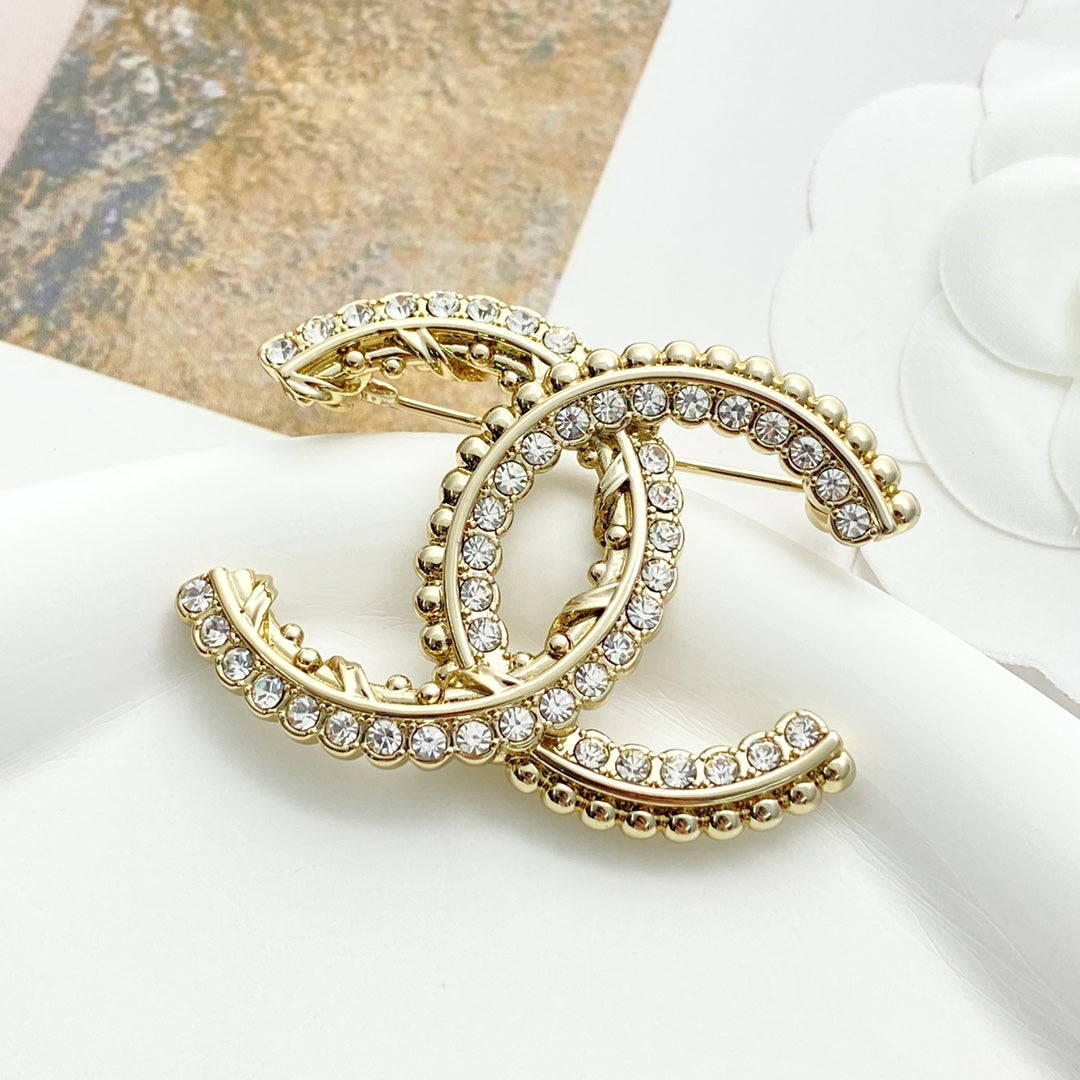Martin Graham brooch in polished metal-tone – detail view