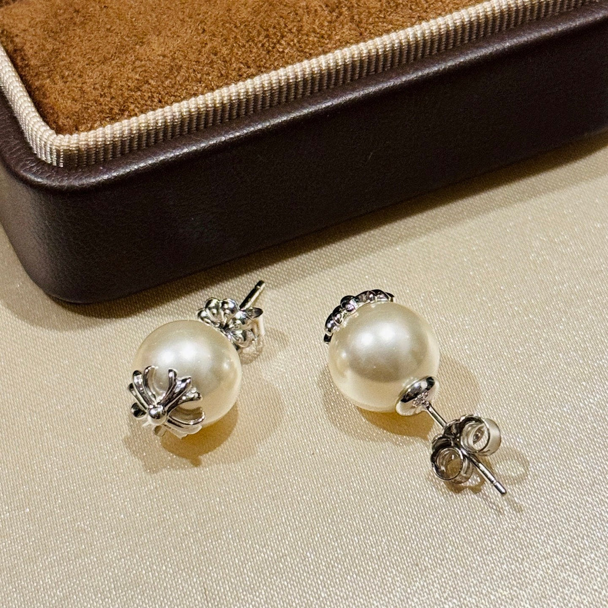 Martin Graham stud earrings in polished metal-tone – main product view