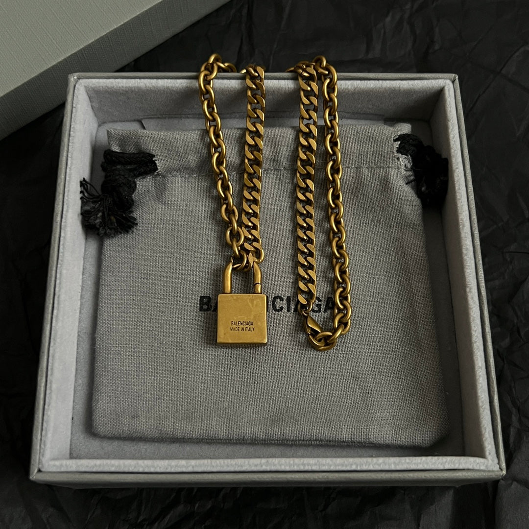 Martin Graham pendant necklace in polished metal-tone – styled product view