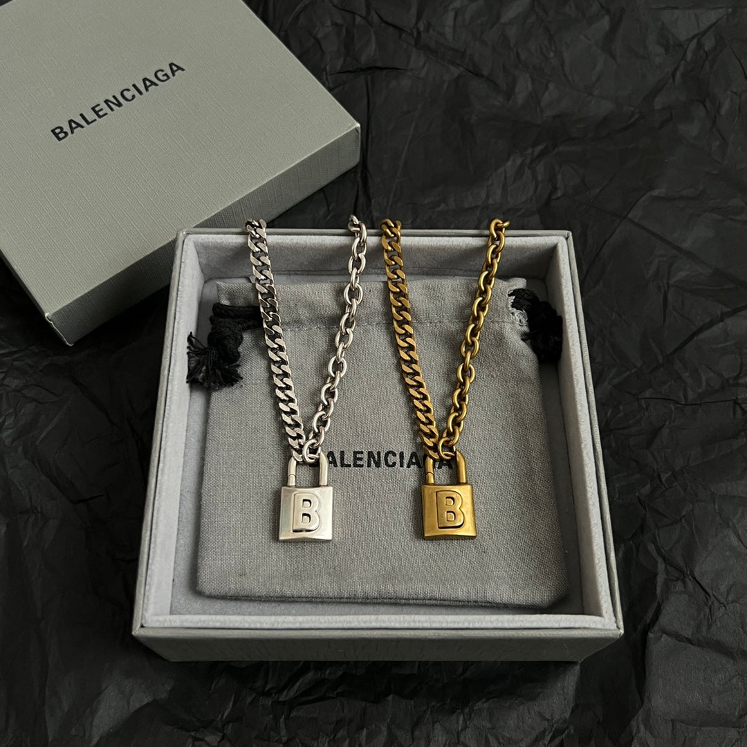 Martin Graham pendant necklace in polished metal-tone – detail view
