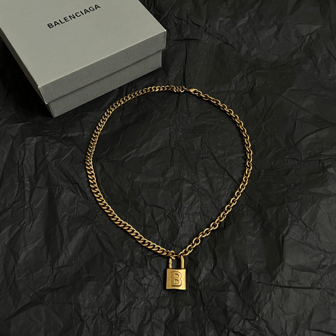 Martin Graham pendant necklace in polished metal-tone – front product view