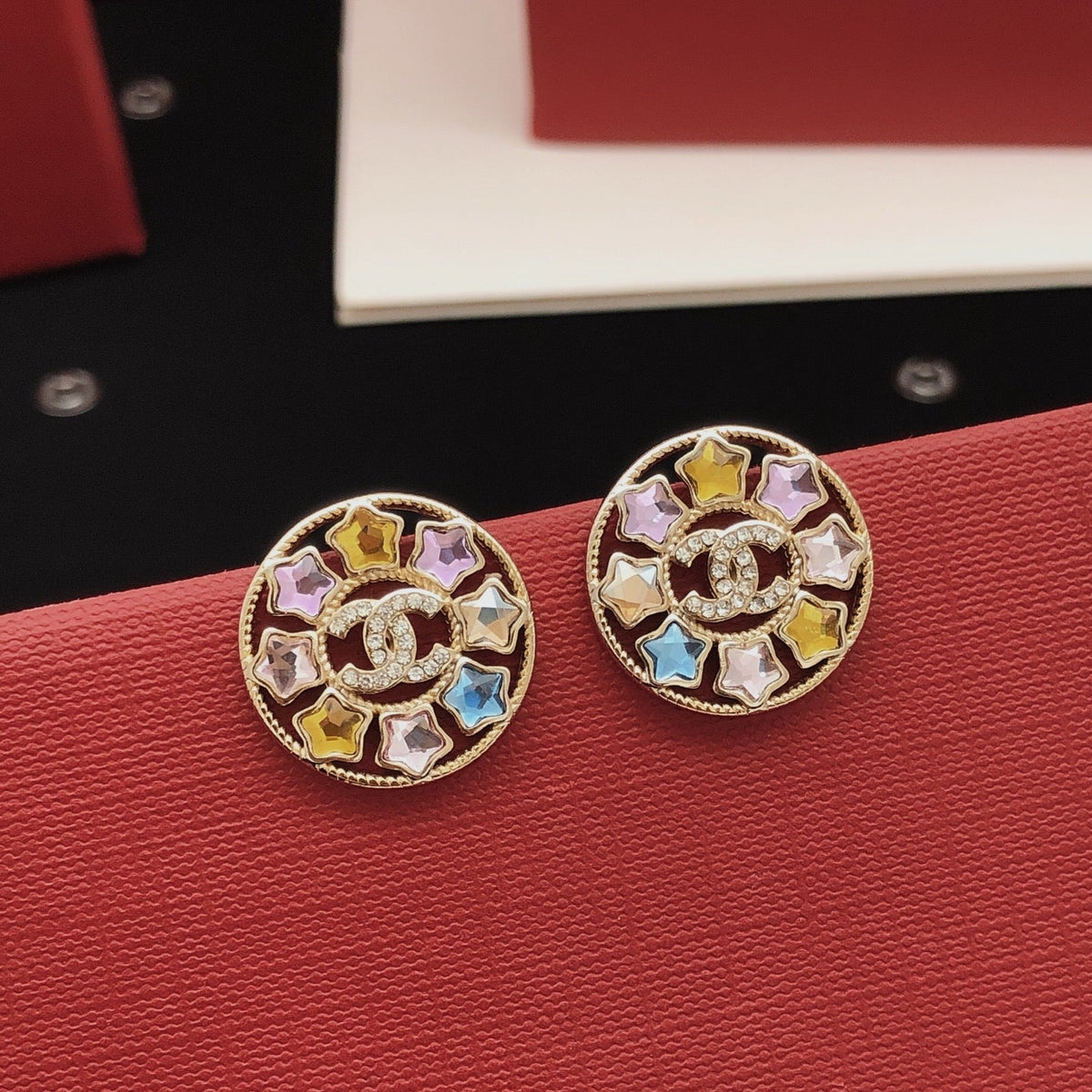 Martin Graham stud earrings in polished metal-tone – detail view