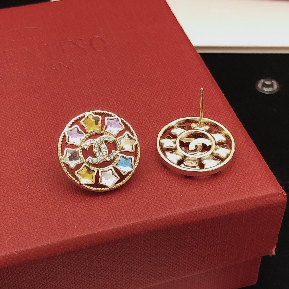 Martin Graham stud earrings in polished metal-tone – styled product view