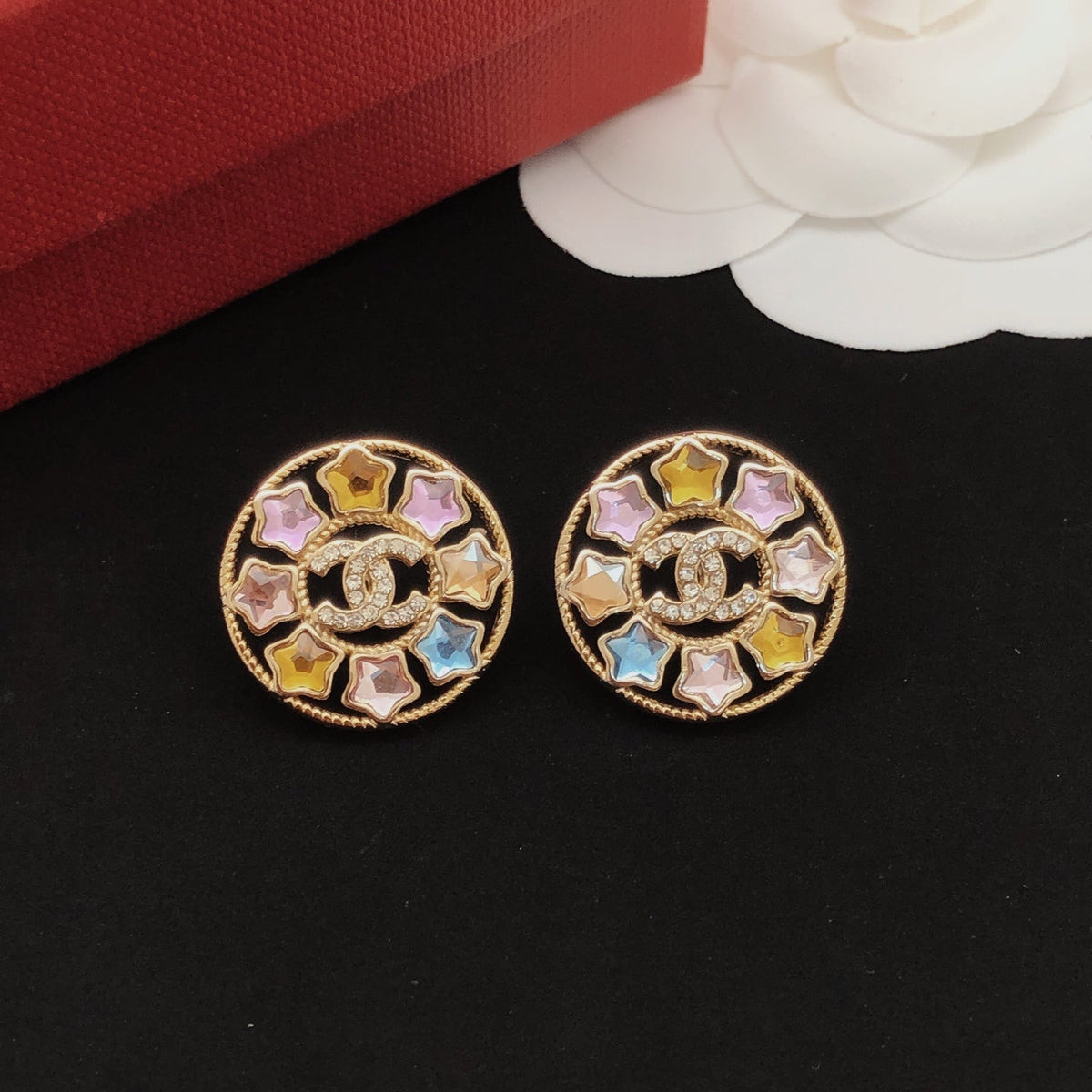 Martin Graham stud earrings in polished metal-tone – front product view