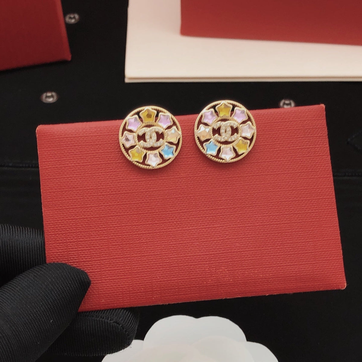 Martin Graham stud earrings in polished metal-tone – side detail