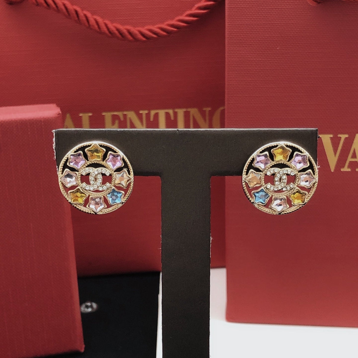Martin Graham stud earrings in polished metal-tone – detail view