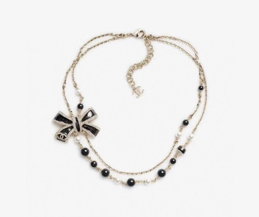Martin Graham pendant necklace in polished metal-tone – front product view