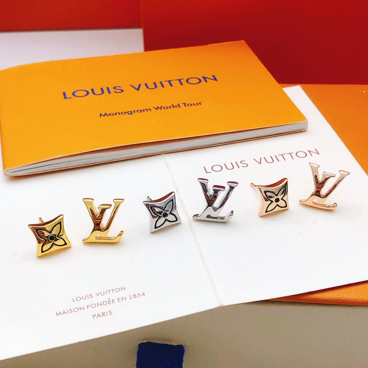 Martin Graham stud earrings in polished metal-tone – styled product view