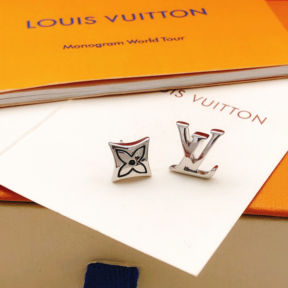 Martin Graham stud earrings in polished metal-tone – detail view