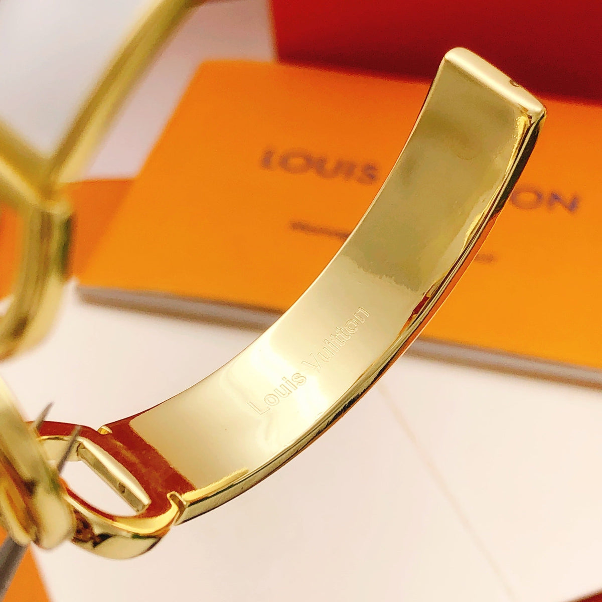 Martin Graham bangle in polished metal-tone – styled product view