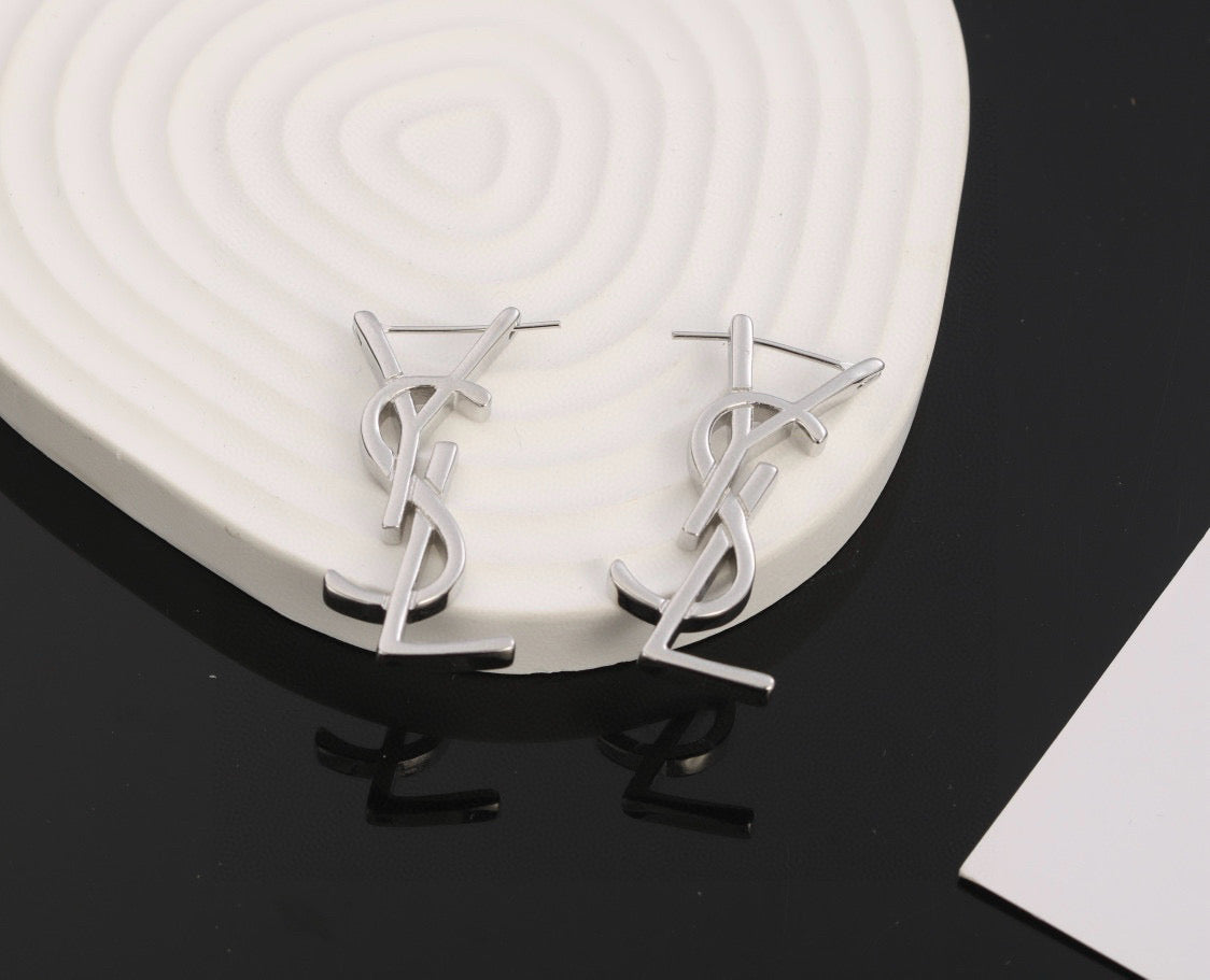Martin Graham stud earrings in polished metal-tone – front product view