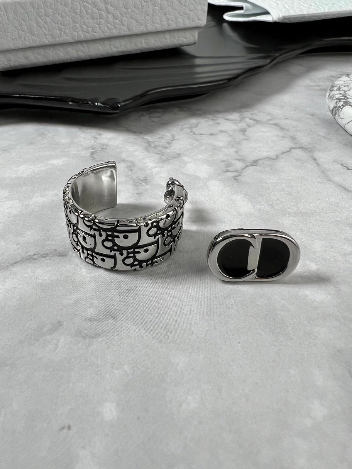 Martin Graham stud earrings in polished metal-tone – main product view