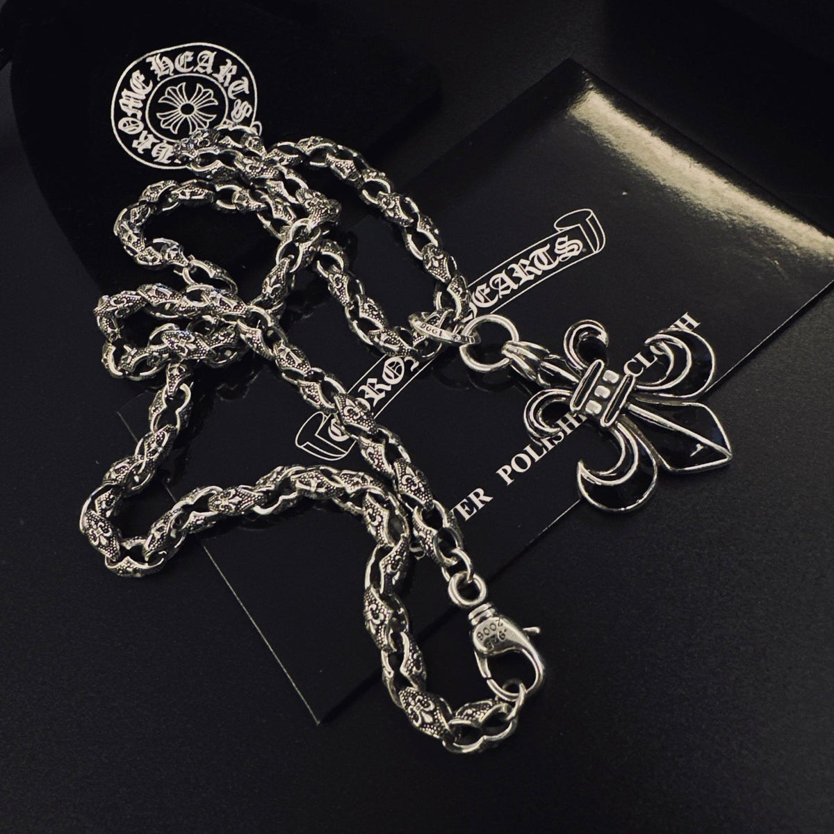 Martin Graham pendant necklace in polished metal-tone – side detail